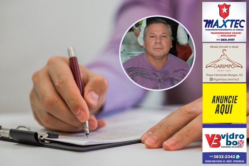 Businessman making notes on the paper in his office